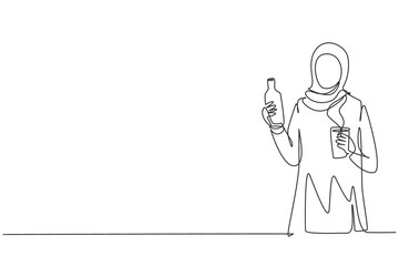Continuous one line drawing young Arabian woman holding bottle in one hand and glass of orange juice in the other while having breakfast at home. Single line draw design vector graphic illustration