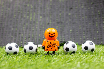 Ghost is playing soccer ball on Halloween Day