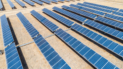 Rows of Solar panels in Solar Farm in rural Chile. Solar energy farm. High angle, elevated view of solar panels on an energy farm.
