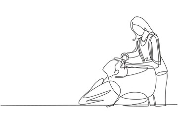 Single continuous line drawing like a princess. Side view photo of young relaxed woman washing hair in hair salon. Hair style beauty concept. Dynamic one line draw graphic design vector illustration