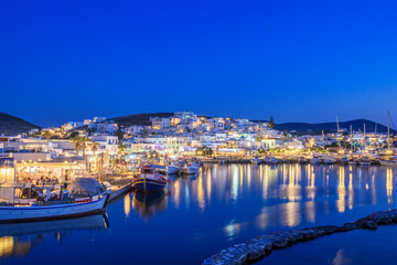 Iconic view from the picturesque seaside village of Naousa on the island of Paros, Cyclades, Greece, during summer period