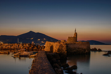 Iconic view from the picturesque seaside village of Naousa in the island of Paros, Cyclades, Greece, during summer period