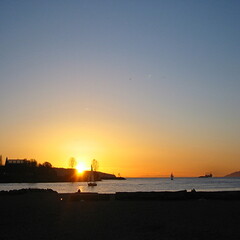カナダのバンクーバーのＥｎｇｌｉｓｈｂａｙと夕日の風景