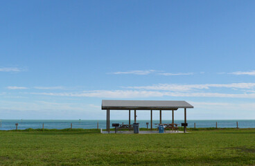 Wood beach fence along Key West beach picnic area in Florida, USA