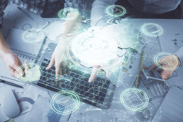 Double exposure of man and woman working together and social network theme hologram drawing. Computer background. connecting concept. Top View.