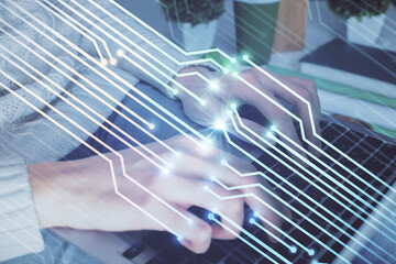 Double exposure of woman hands working on computer and data theme hologram drawing. Tech concept.