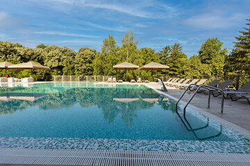 Outdoor swimming pool in a modern new luxury hotel