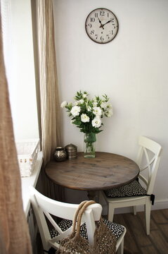 Rustic kitchen interior with flowers bouquet