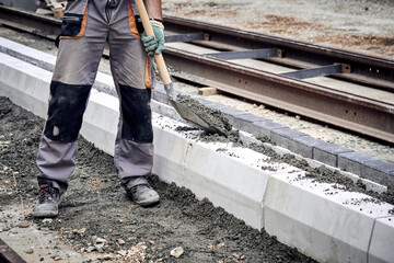 Construction worker on a public road reconstruction.