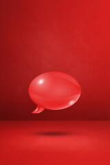 Red speech bubble on concrete wall vertical background