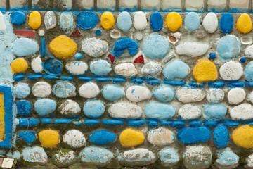The background texture of colored stone wall