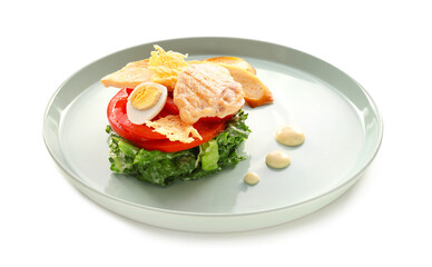 Plate with Caesar salad on white background