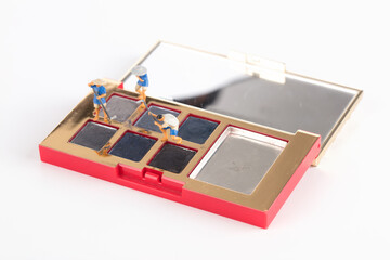 Miniature scene of a farmer farming in a vanity box