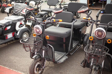 Electric motorcycles are in a row.