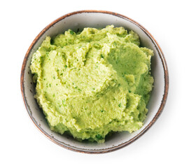 Bowl with tasty guacamole on white background