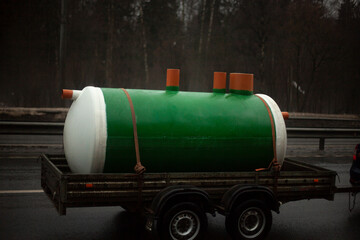 Waste disposal tank transportation.