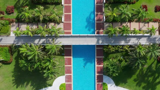 Aerial top down shot of huge pool at Hard rock Hotel in Punta Cana during summer. Luxury hotel resort.
