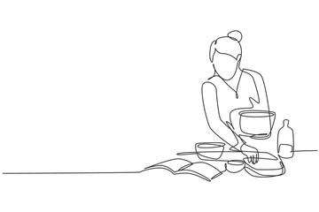 Fototapeta na wymiar Single one line drawing beautiful woman cooking meal while reading tutorial book on cozy kitchen table at home. Healthy food lifestyle. Modern continuous line draw design graphic vector illustration