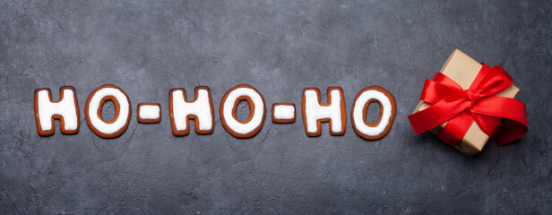 Christmas greeting card with homemade gingerbread HO-HO-HO