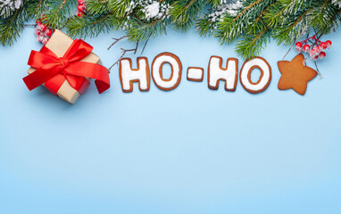 Christmas greeting card with homemade gingerbread HO-HO