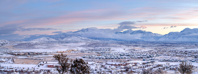 A view of the valley and the mountain covered with clouds