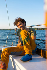 portrait of a laughing man on a yacht