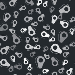 Grey Avocado fruit icon isolated seamless pattern on black background. Vector