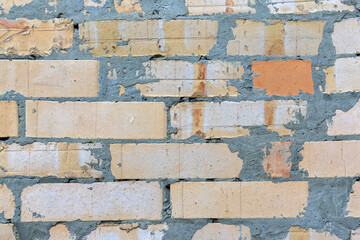background bricks wall smeared with mortar cement
