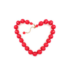 Red round beads isolated on white background