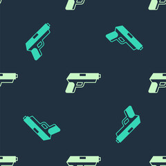 Green and beige Pistol or gun icon isolated seamless pattern on blue background. Police or military handgun. Small firearm. Vector