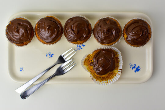 Plate Of Chocolate Topped Banana Bread Muffins 