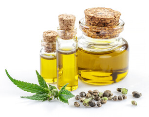Cannabis leaves, seeds and hemp oil isolated on white background. Close up.