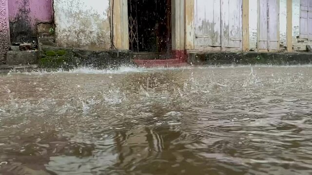 Flood After Heavy Rain On The Street Near Trimbakeshwar City In Trimbak, Maharashtra, India. - Static Shot, Slow Motion