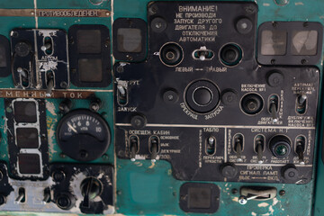 Toggle switches old soviet helicopter mi2 many text Russian language which translates Light danger Beacon Suspension Cargo Dump Tactical Emergency