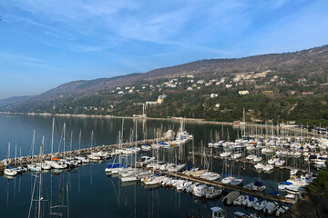 Fototapeta na wymiar Trieste. Italy. View of the marina of Grignano a small port near Miramare