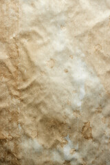 Retro texture of old paper sheet with different stains and blots on a surface