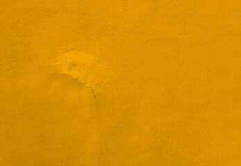 Wall textured rusty painting gold yellow background of cement.