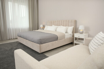 Beautiful hotel room interior with double bed