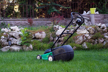 small lawn mower on the grass.