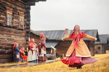 Traditional Slavic rituals in the rustic style. Outdoor in summer. Slavic village farm. Peasants in...