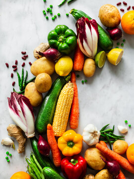 Fresh vegetables - multicolored, flat lay, white background, bright image