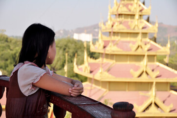 Burmese girl women people travel visit and standing looking view landscape cityscape of mandalay...