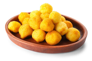 Plate with fried potato balls on white background