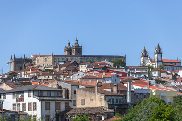 Fototapeta na wymiar View at the Viseu city, with Cathedral of Viseu and Church of Mercy on top, Se Cathedral de Viseu e Igreja da Misericordia, monuments of various classical styles, architectural icons of the city