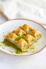 Pistachio baklava. Baklava with pistachio on a white background. Local name cimcik baklava