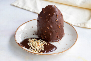 Chocolate and pistachio cake on a white background