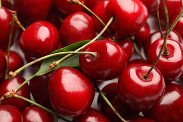 Heap of tasty ripe cherries as background, closeup