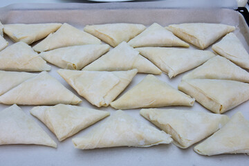 A ready-to-bake patty folded into a triangle.