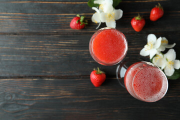 Concept of delicious drink with Rossini cocktail on rustic wooden table