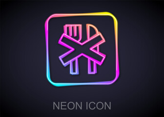 Glowing neon line Ramadan fasting icon isolated on black background. Religious fasting. Vector